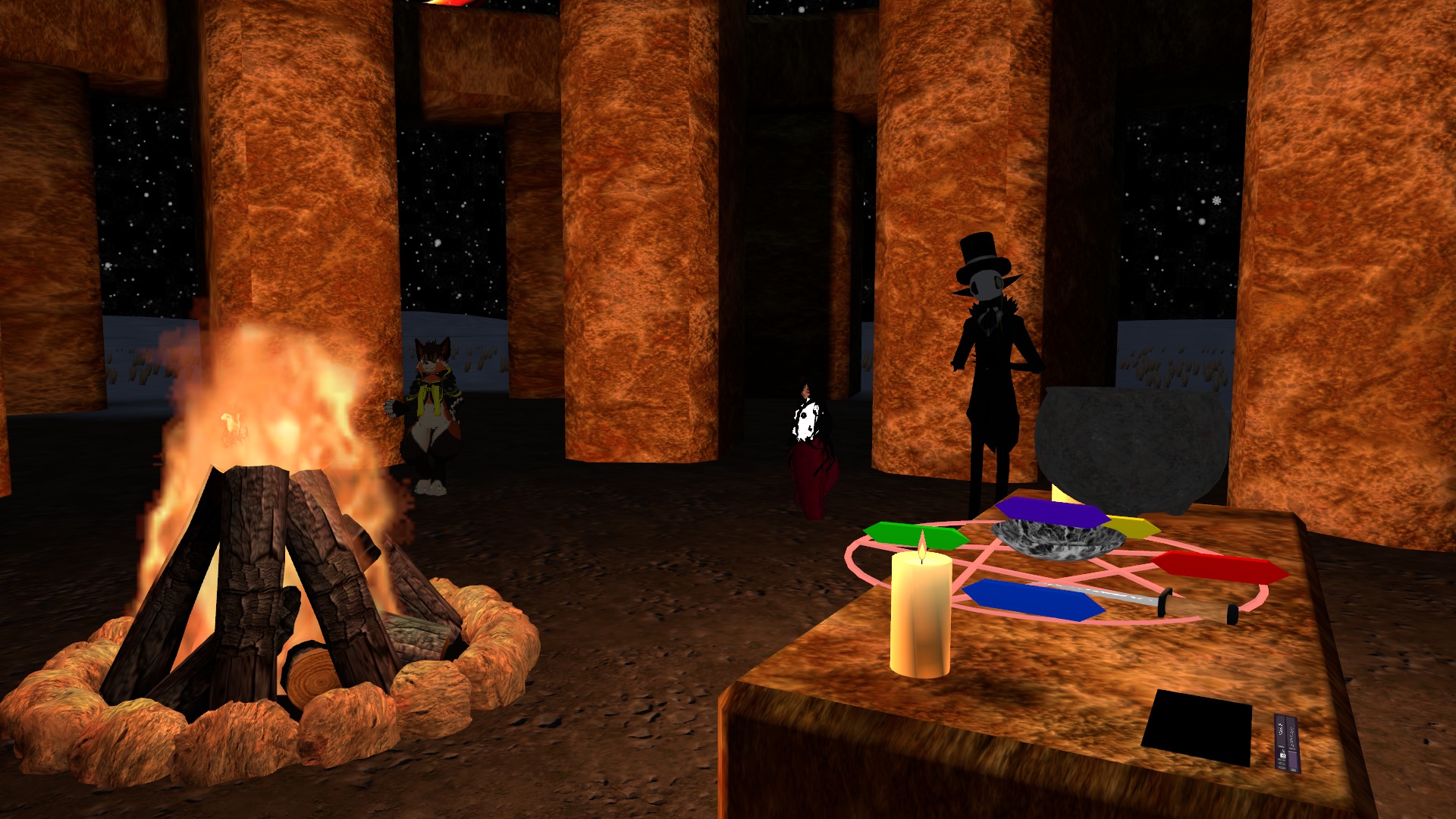 A ceremonial bonfire burning inside the great stone circle while community members gather